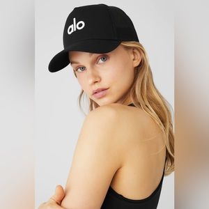 All Yoga District Trucker Hat- black and white. Worn 1x- perfect condition.